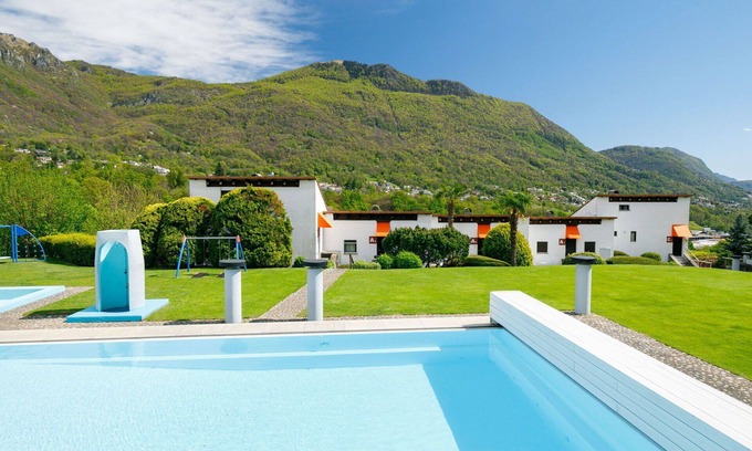Capriasca Apartment | Nice apartment for 5 people with pool, WIFI, TV, patio, pets allowed, panoramic view and parking