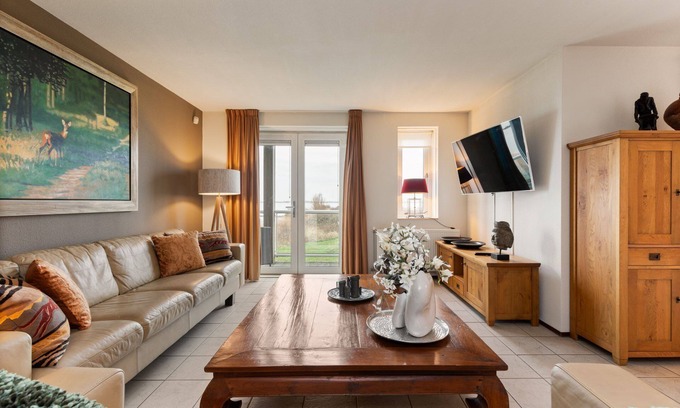 Municipality of Hellevoetsluis Apartment | Nicely furnished 4-pers. apartment with unique harbor view located at Cape Helius holiday park.