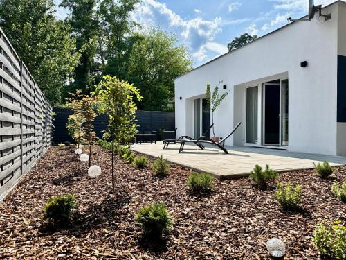 Bielany Villa | Nowoczesny Dom z Ogrodem w Warszawie 'NOWY OBIEKT'