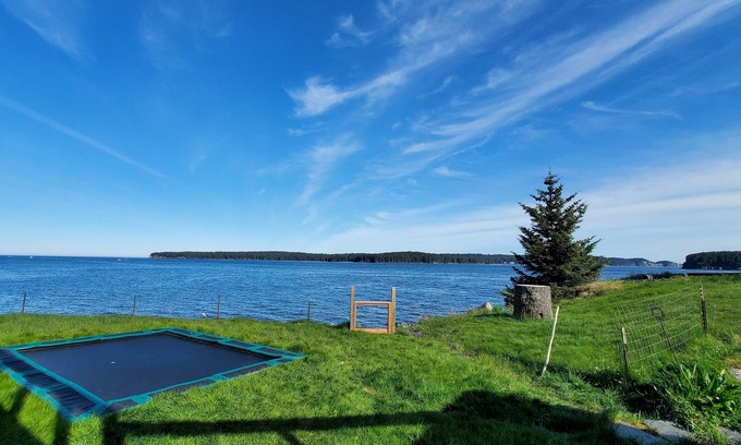 Kodiak House | Ocean view modern guest suite with private beach access