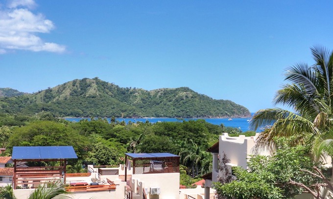 Coco Sunset Hills Condo | Oceanviews on a Budget - Massive Rooftop Patio