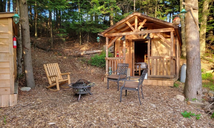 Rome Cabin | Off Grid Cabin nestled in the woods next to a stream at the base of Tug Hill