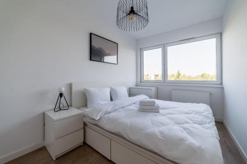 Suchy Las Apartment | Osiedle Szafirowe Chic Apartment by BookingHost