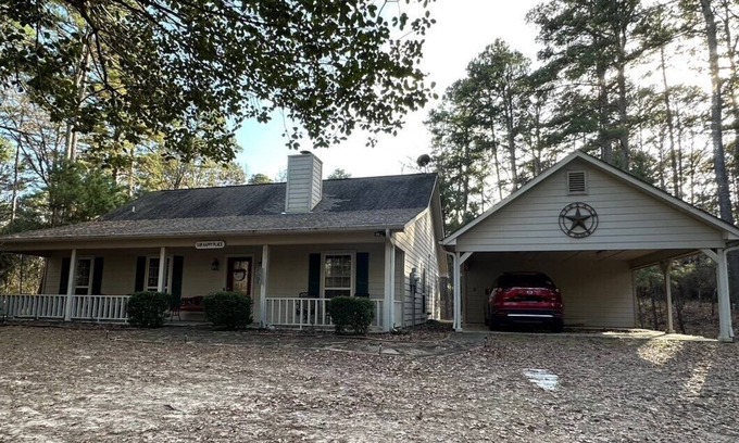 Holly Lake Ranch House | Our Happy Place is located in the gated community of Holly Lake Ranch.
