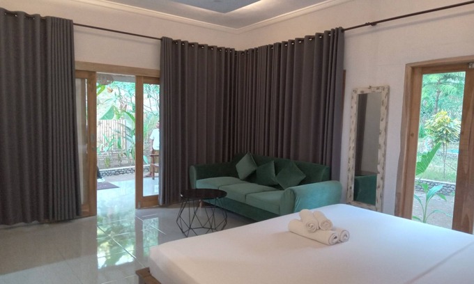 Mangsit Hotel | OYO 93748 Tungku Klui Hotel