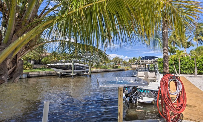 Palm City House | Palm City Canalfront Home w/Boat Dock & Fire Pit!