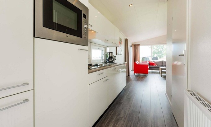 Aalst Ski Chalet | ✓ Parel at Recreatiepark het Esmeer ✓ Holiday home for 4 persons ✓ Located in Aalst (Gelderland) ✓ Waterside holiday park ✓ Book directly through the park