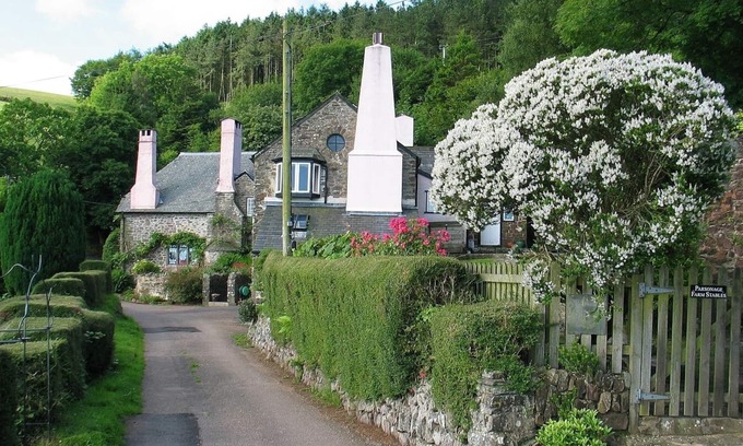 Culbone Cottage | Parsonage Farm Stables, with stunning views down to the sea