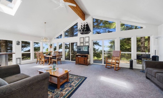 Cape Meares Cottage | Peaceful 4BR Cape Meares Home | Ocean Views, Forest Setting, Wraparound Deck + King Bed
