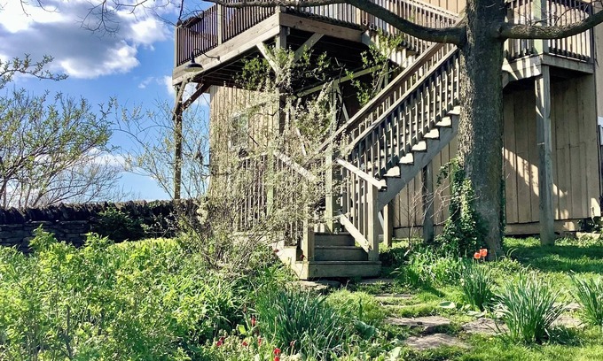 Paris House | Peaceful, historic 3-bedroom barn loft on a horse and flower farm in Paris.
