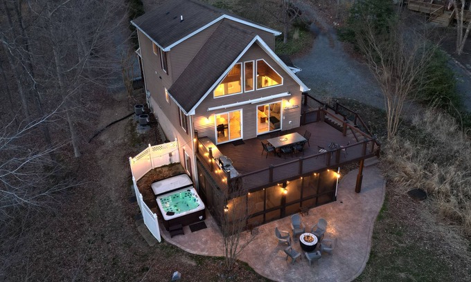 Bumpass House | Peaceful Lakefront Retreat with Hot Tub, Firepit and Boat Dock