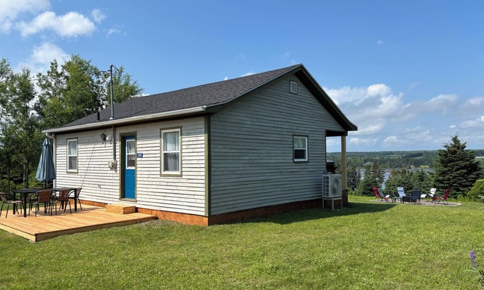 Souris Cottage | Peaceful river view cottage close to world class sandy beaches