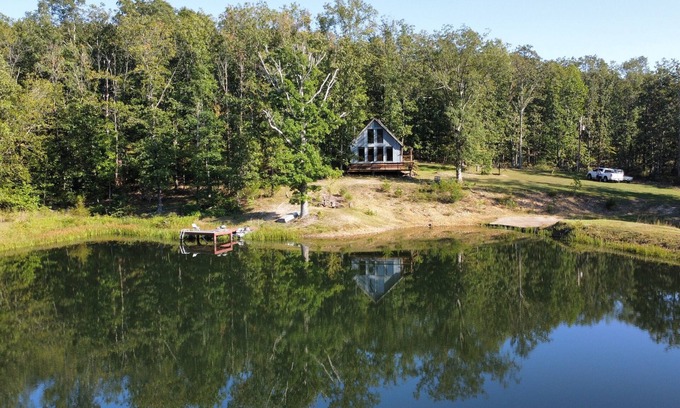 Elk Creek Cabin | Peaceful secluded cabin nestled on 40 wooded acres overlooking 4 acre pond.