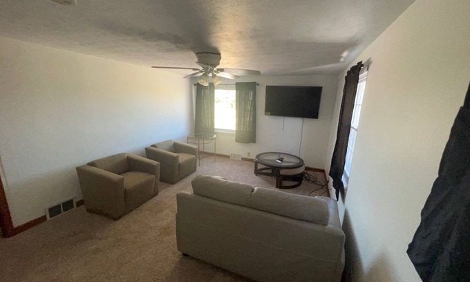 Gypsum Apartment | Pebbles Suite above Bedrock Tavern