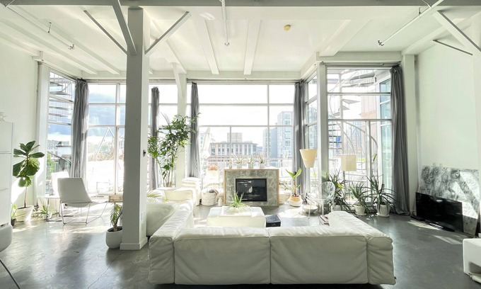 Gastown Condo | Penthouse loft with deck, rooftop and fireplace in historic Gastown, Vancouver.
