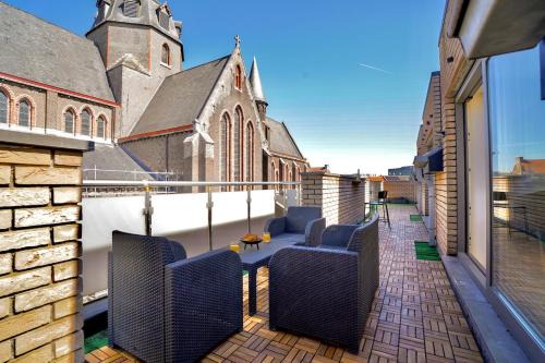 Rabot Apartment | Penthouse with a Neo-Gothic Parish church view