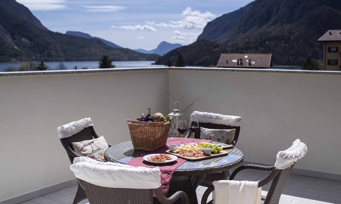 Molveno Apartment | Penthouse with lake and mountain views in Molveno