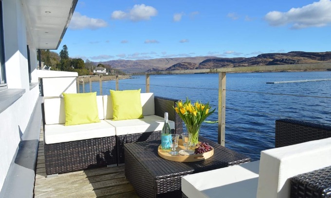Tighnabruaich House | Perfect, restful, dramatic holiday home with fabulous 18 m balcony over the sea