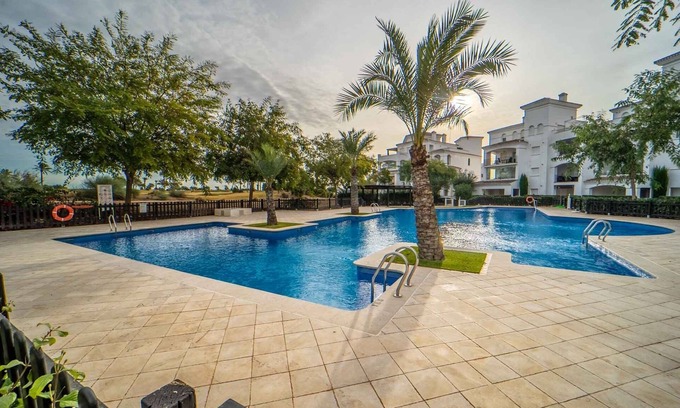 Roldan Apartment | Perfectly located 2 bedroom ground floor golf course view poolside apartment