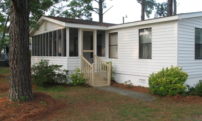 Ocean Isle Beach Cottage | Pet friendly, 3 bedroom, 2 bath, 2 piers, boat ramp, large porch, yard, waterway