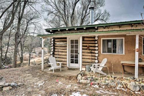 San Cristobal House | Petite Log Cabin on Organic Farm in New Mexico