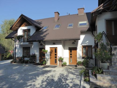 Poreba Wielka House | Pokoje i apartamenty pod Jaworzyną w Koninkach