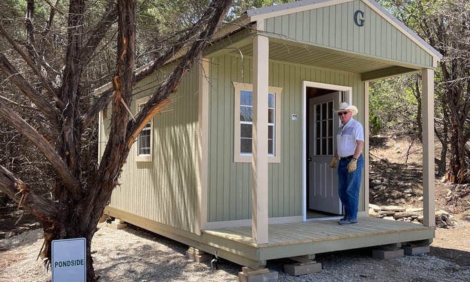 Graham RV Rental | Pondside Primitive Cabin at Lake Godstone