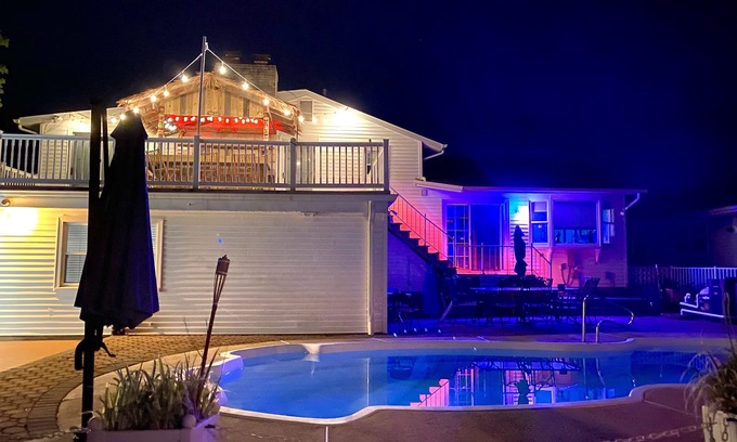 Osborn Island House | POOL, TIKI BAR, WATERFRONT home, 8 LBI Beach passes in Mystic Island NJ