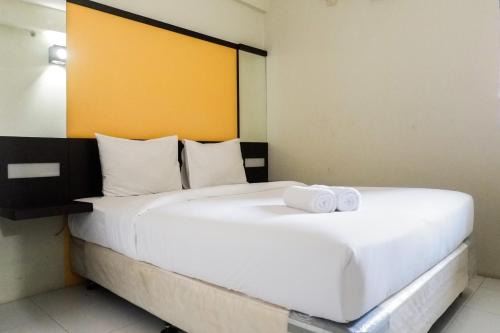 Surabaya Apartment | Pool View 2BR at Dian Regency Apartment By Travelio