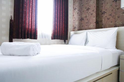 Pekayon Jaya Apartment | Pool View 2BR Mutiara Bekasi Apartment By Travelio