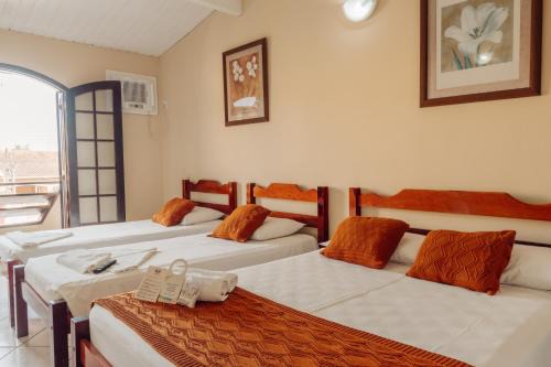 Jardim Itagua Hotel | Pousada Florescer