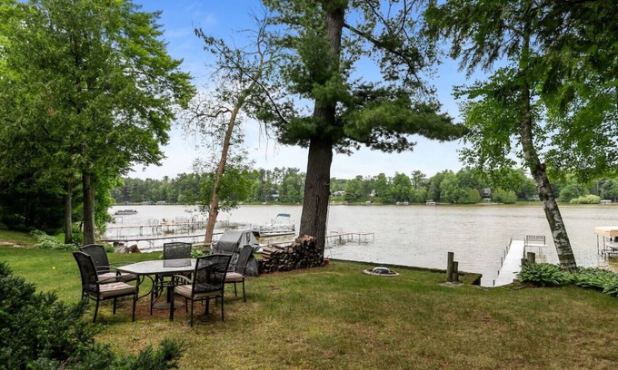 Shawano House | Private Dock! Lakefront! Paddleboards! Firepit