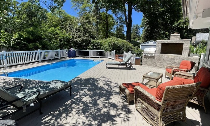 Union Pier House | Private heated pool hot tub large deck blocks to Berrien beach