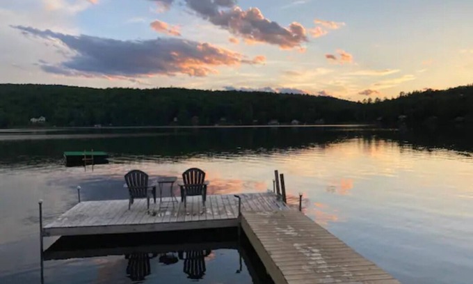 Concord RV Rental | Private Lakeside Camping with Included Tent, Air Mattresses, Kayaks, Fire Wood