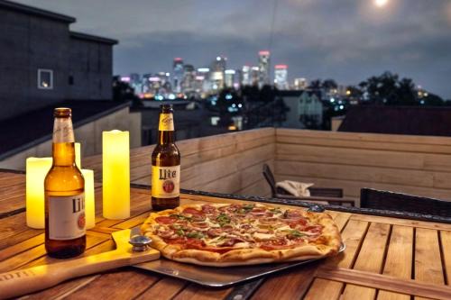 Greater East End House | Private Rooftop in Houston's Downtown! Pizza Oven and Skyline Views