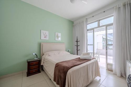 Ipanema House | Quarto c/vista e suíte em Ipanema