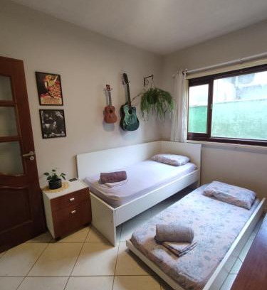 Cabecudas House | Quarto Felicidade Cabeçudas