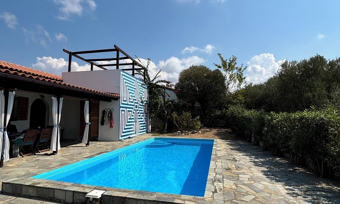 Roumeli Villa | Quiet 2 bedroom air-conditioned villa with private pool, patio and roof terrace