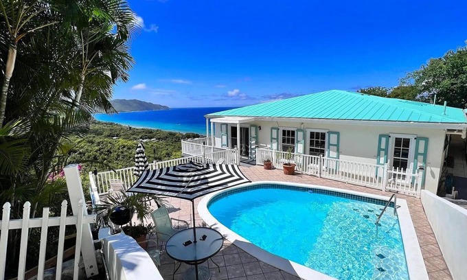 Estate Kingshill Villa | Quiet hillside villa with expansive sea, beach, and mountain views.