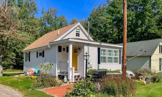 Meredith Cottage | Quintessential lakeside cottage with swimming, picnic tables, & mountain view