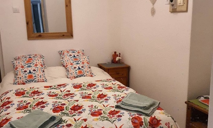 Koppanyszanto Bed & Breakfast | Quirky, character guestroom in loam cottage in rural Hungary with outdoor pool