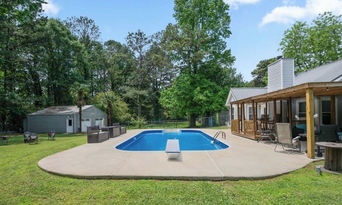 Hampton House | Race Day Retreat: Poolside Haven Near Nascar Track