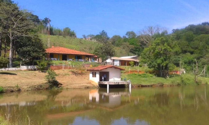 Sao Joao Novo House | Recanto das Corujas site, with a farmhouse style mansion