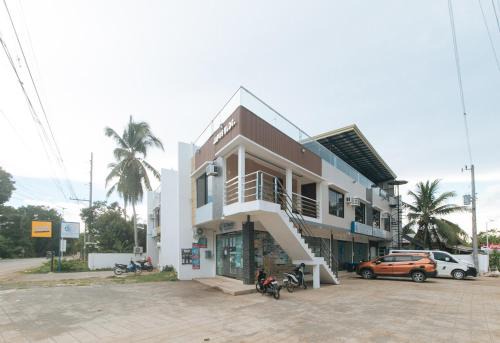 Dauis Hotel | RedDoorz at Happy Stay Apartelle