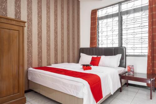 Malang House | RedDoorz near Universitas Widyagama Malang