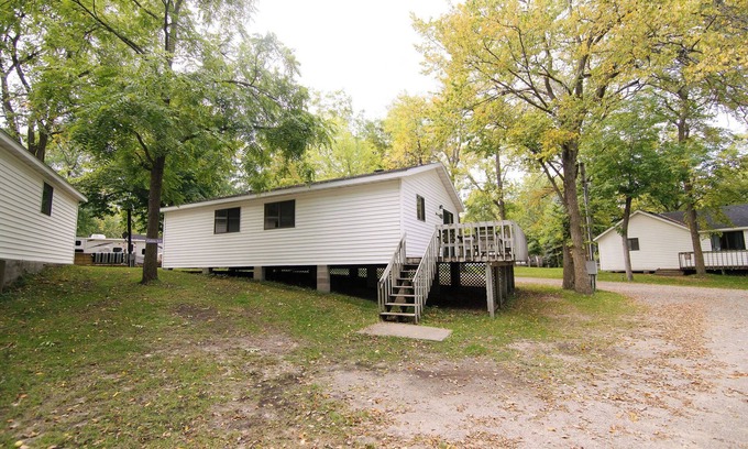 Richmond Cabin | Reel 'Em Inn, a spacious 4BR cabin with queens in every room at Riverside Resort