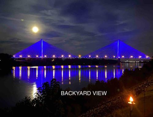 Russell House | Relax at Rivertime with a Bridge and River view, plus a HotTub