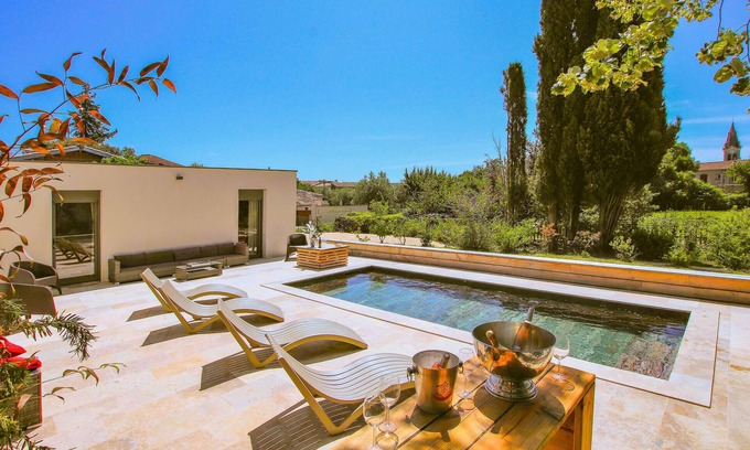 Vagnas House | Relax to the fullest in this idyllically located vacation home with pool.