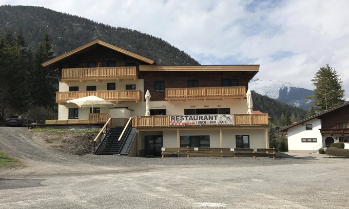Biberwier Apartment | Relax wonderfully, and into an apartment with a view of the slopes/mountains.