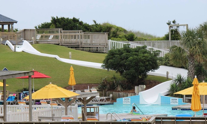Morehead City Condo | Renovated 2021!Family Fun 2br/2b Vacation Rental! Pools, waterslide, mini golf!